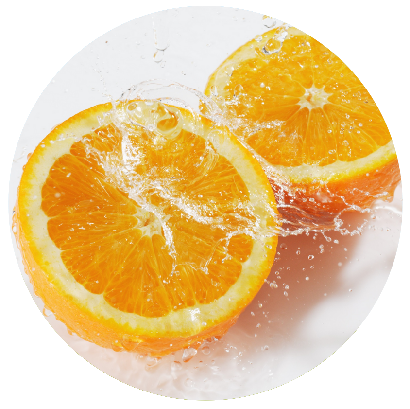 Two slices of orange on a white background