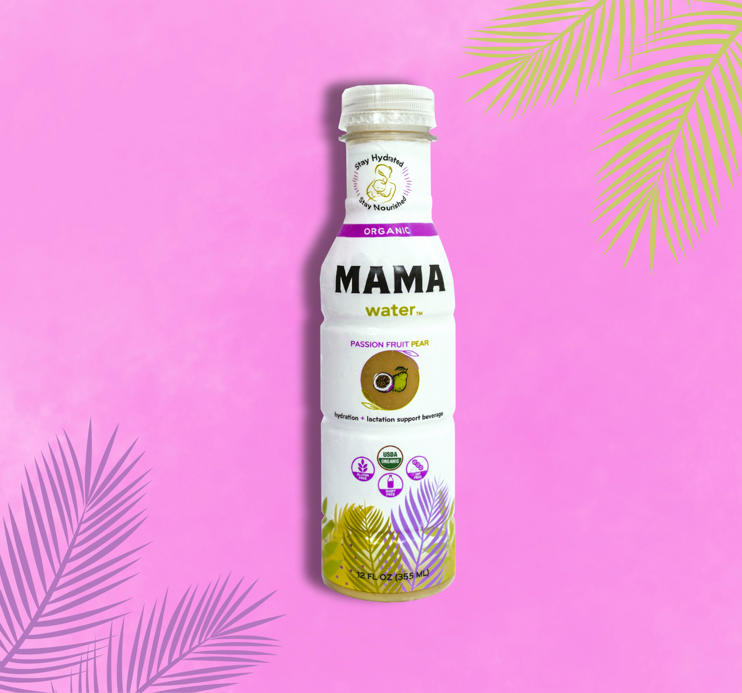 Bottle of 'MAMA water' on a pink background with palm leaf decorations